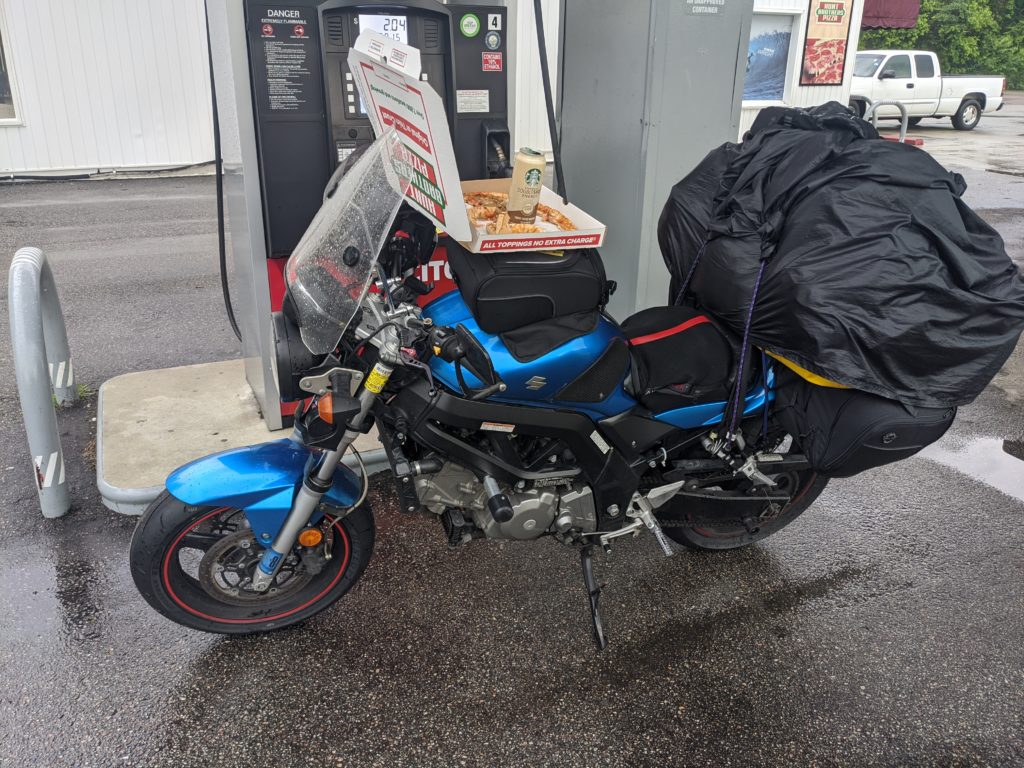 Motorcycle by gas station
